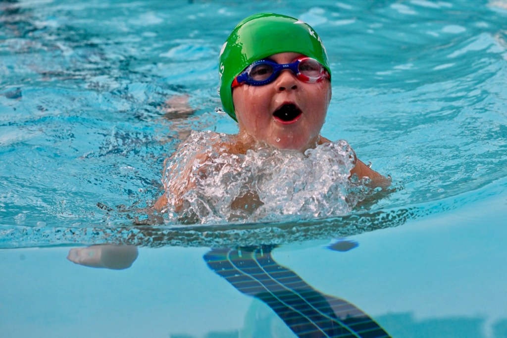 Kingstream Kahuna swimming breaststroke in meet against Bradley Farms